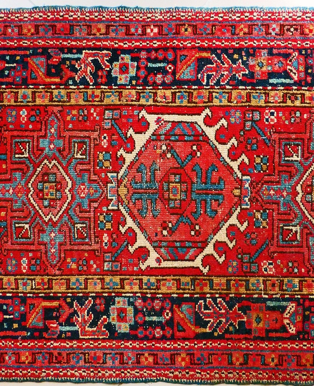A hand-knotted Persian silk carpet